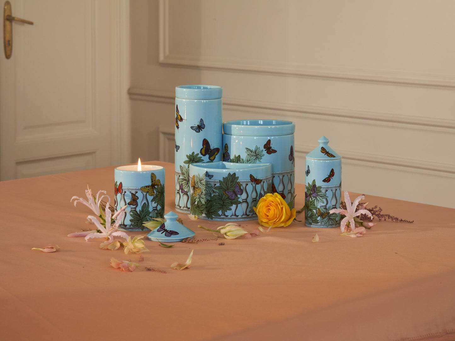Fornasetti NEL MENTRE tall scented candle - Décor Farfalle e balaustra - Fragrance Giardino Segreto - Milk Concept Boutique